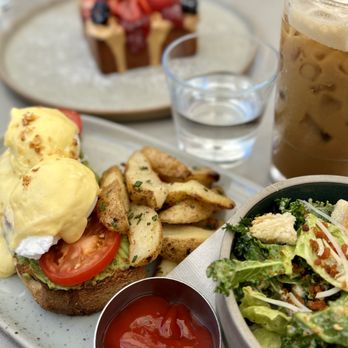 1931 Gallery Bistro - PB & J French Toast $15 Avocado & Tomato Benedict $18
Iced Latte w/ Lavender shot $6.5 + $0.5 - Breakfast & Brunch Near Me - Vancouver, British Columbia 1931 Gallery Bistro - PB & J French Toast $15 Avocado & Tomato Benedict $18
Iced Latte w/ Lavender shot $6.5 + $0.5 - Breakfast & Brunch Near Me - Vancouver, British Columbia