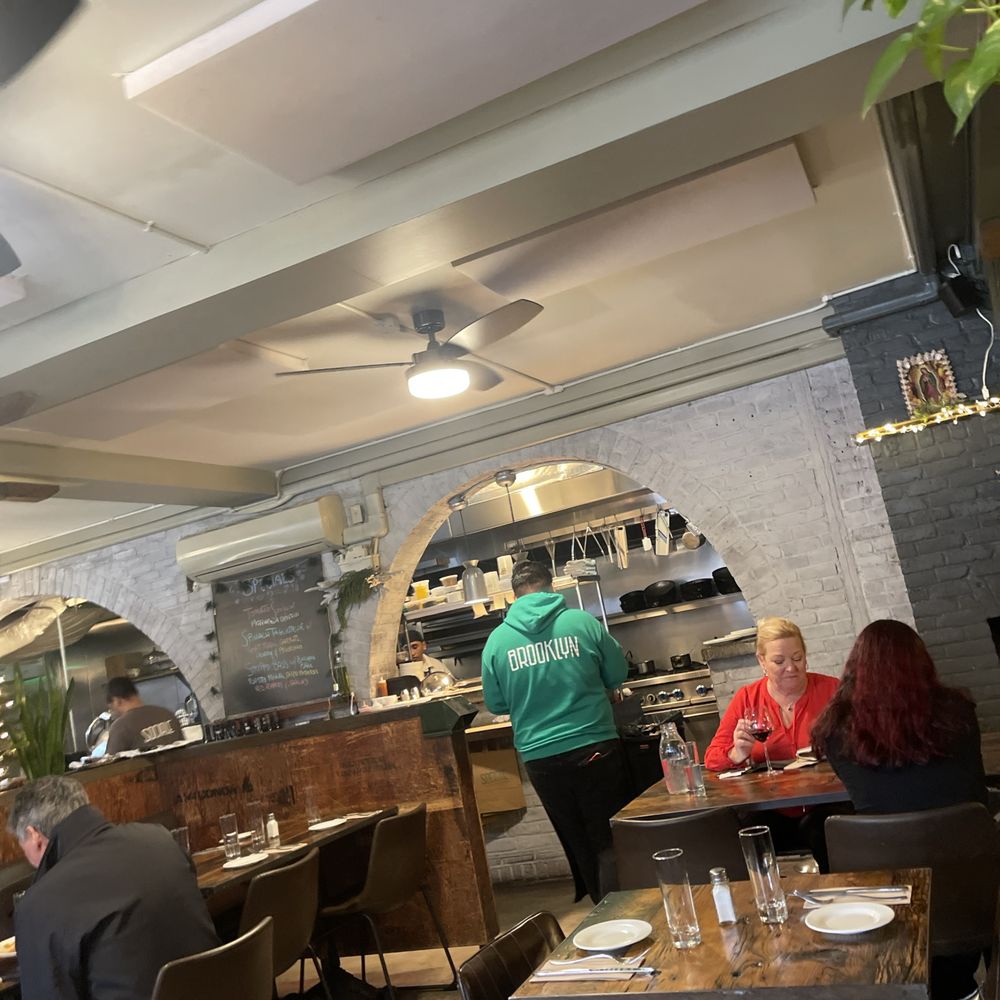 Sociale - people sitting at tables in a restaurant - Italian Near Me - New York, New York Sociale - people sitting at tables in a restaurant - Italian Near Me - New York, New York