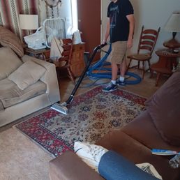 Barry at work cleaning the carpet.