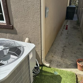 Andy's Rain Gutters - Back of house - Gutter Services Near Me