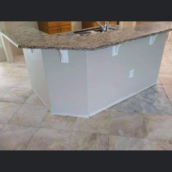 Corismic Creation's - a kitchen island with granite counter tops - Flooring Near Me Corismic Creation's - a kitchen island with granite counter tops - Flooring Near Me