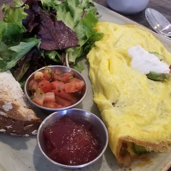 First Watch - The BACADO omelet is the bacon avocado omlet. comes with dressed greens, or you can have seasoned potatoes instead. - Breakfast & Brunch Near Me - Ft Collins, Colorado