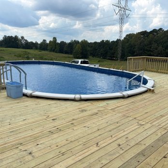 Smith&Co - The new deck around our oval shape above ground pool. - Handyman Near Me - Arab, Alabama Smith&Co - The new deck around our oval shape above ground pool. - Handyman Near Me - Arab, Alabama