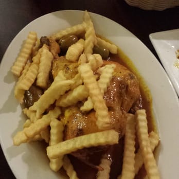 Merguez Restaurant - Chicken tajine with olives and fries! - Moroccan Near Me - Orlando, Florida Merguez Restaurant - Chicken tajine with olives and fries! - Moroccan Near Me - Orlando, Florida