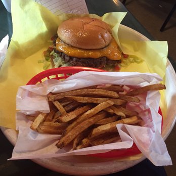Chris Madrid's - 1/2 pound burger and small fries - Burgers Near Me - San Antonio, Texas Chris Madrid's - 1/2 pound burger and small fries - Burgers Near Me - San Antonio, Texas