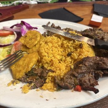 La Casa Restaurant & Rum Bar - Steak Chimichurri w Yellow Rice & Tostones Churrasco With Chimichurri Sauce - Cocktail Bars Near Me - Raleigh, North Carolina La Casa Restaurant & Rum Bar - Steak Chimichurri w Yellow Rice & Tostones Churrasco With Chimichurri Sauce - Cocktail Bars Near Me - Raleigh, North Carolina
