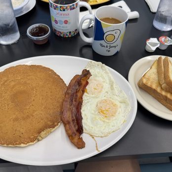 Kim & Jenny's Cafe - Breakfast Pancake with over easy eggs and bacon - Southern Near Me - Duncanville, Texas