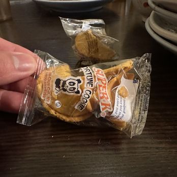 Nomad Asian Bistro - Hard to see but there's two fortune inside this one cookie, the second one is still inside the unbroken cookie - Chinese Near Me - Long Beach, California Nomad Asian Bistro - Hard to see but there's two fortune inside this one cookie, the second one is still inside the unbroken cookie - Chinese Near Me - Long Beach, California