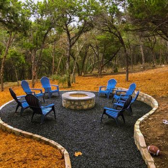 Extreme Landscape - a fire pit surrounded by lawn chairs - Landscaping Near Me Extreme Landscape - a fire pit surrounded by lawn chairs - Landscaping Near Me