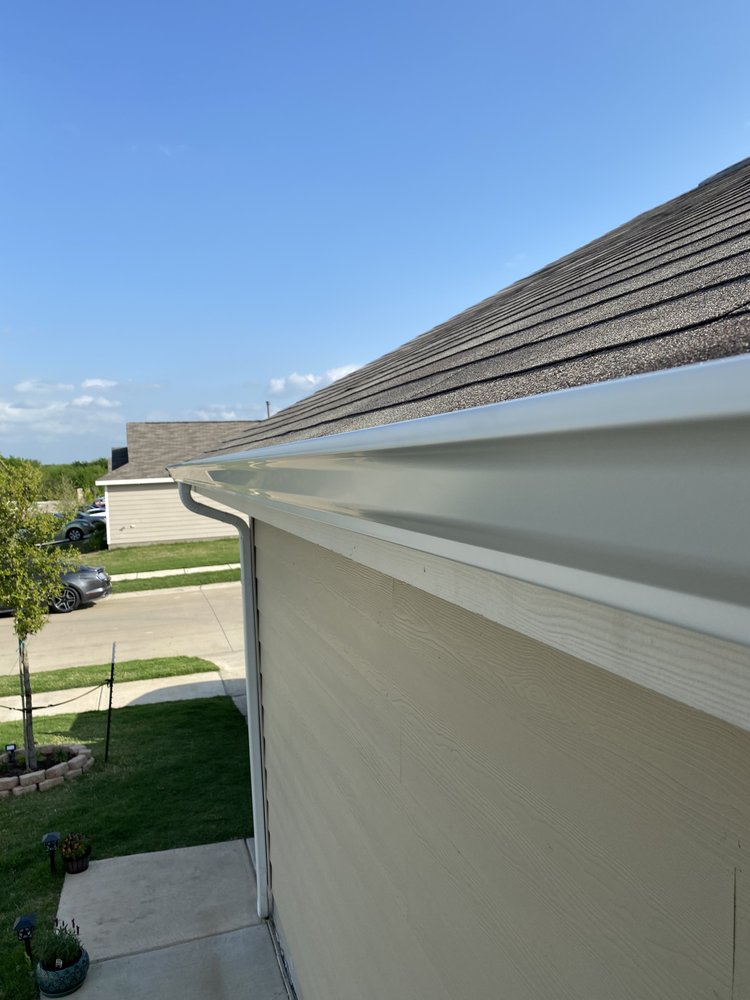 Slide of Holguin Roofing & Exteriors