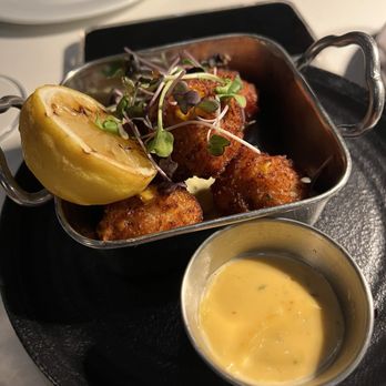 Roots Coastal Kitchen - Conch Fritters - Caribbean Near Me - Río Grande, Puerto Rico Roots Coastal Kitchen - Conch Fritters - Caribbean Near Me - Río Grande, Puerto Rico