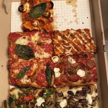 Taglio Pizza - So many random slices - Pizza Near Me - Mineola, New York