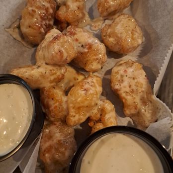 Barrel House Kitchen & Bar - Boneless GF chicken bites with garlic parmesan sauce and Bleu cheese sides - Pizza Near Me - Mason, Ohio Barrel House Kitchen & Bar - Boneless GF chicken bites with garlic parmesan sauce and Bleu cheese sides - Pizza Near Me - Mason, Ohio
