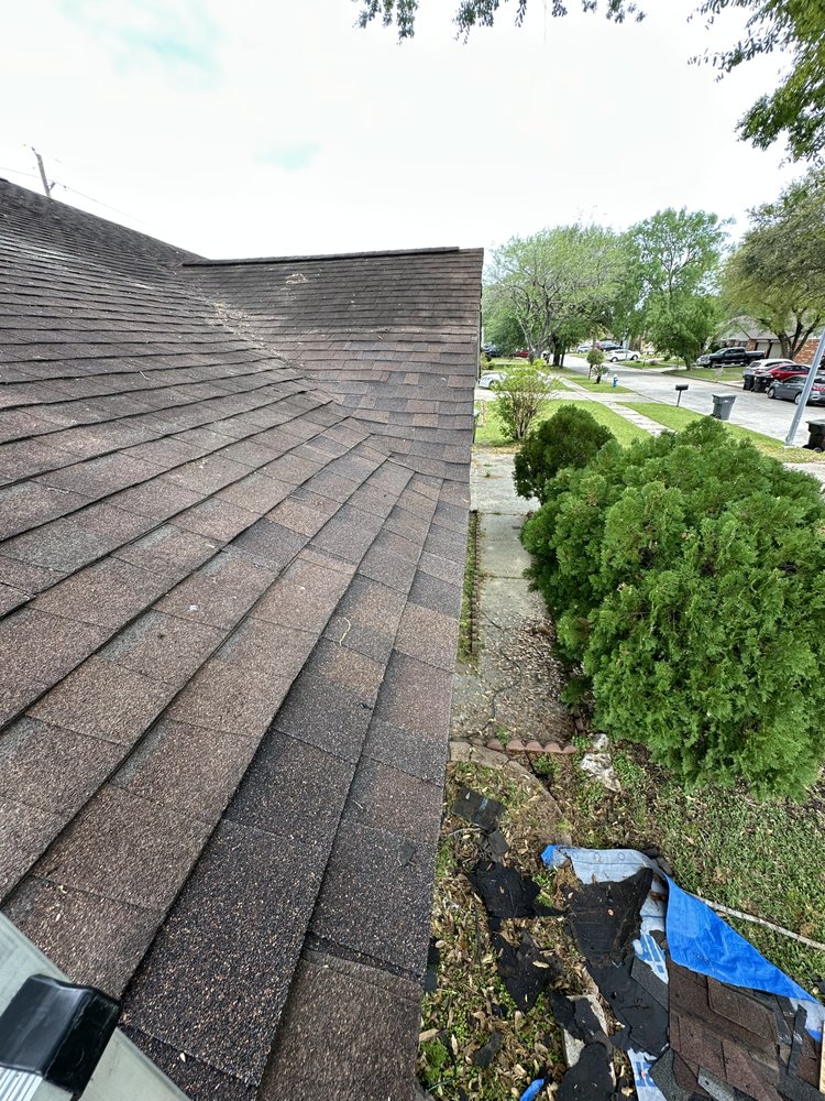 Slide of Redeemer Roofing