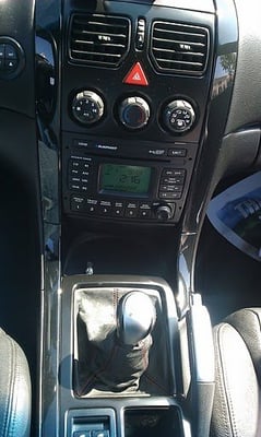 Photo of The Works Auto Body - Santa Clara, CA, US. 2005 GTO trim painted the same exterior gloss metallic black