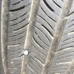 East Side Service Center - 3" drill bit in my tire