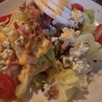 Bistro 70 - Wedge salad with house-made French dressing - New American Near Me - Painesville, Ohio