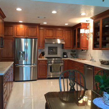 Cherry Wood Cabinets With Granite Countertops With Round
