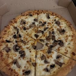 Domino's Pizza - Very dry, very hard with basically no flavor or sauce underneath