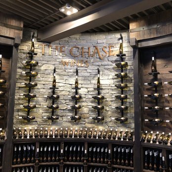 The Chase - a display of bottles of wine - Wineries Near Me - Lake Country, British Columbia The Chase - a display of bottles of wine - Wineries Near Me - Lake Country, British Columbia