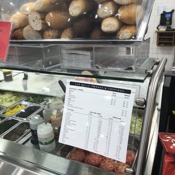 Publix - a counter with a variety of food items - Grocery Near Me - Lilburn, Georgia Publix - a counter with a variety of food items - Grocery Near Me - Lilburn, Georgia