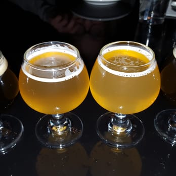 HopCat - Flights! This one here: Brickway Coffee stout, Infusion Pistachio choc. stout, Infusion Vanilla Lager, SchillingBridge Lemon Lime lager. - Burgers Near Me - Lincoln, Nebraska