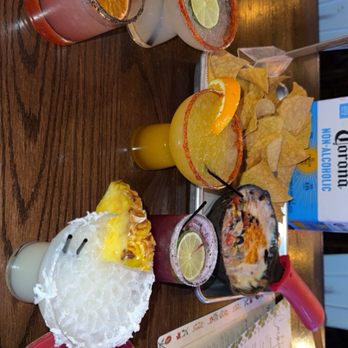 Mamacita's ModMex - Spicy marg; classic; mango marg; blackberry marg; coconut marg. Marg flight. Also the bean dip in back!! - Tex-Mex Near Me - Trenton, Michigan Mamacita's ModMex - Spicy marg; classic; mango marg; blackberry marg; coconut marg. Marg flight. Also the bean dip in back!! - Tex-Mex Near Me - Trenton, Michigan