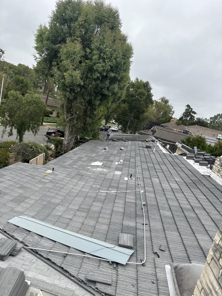 Slide of Twins Roofing