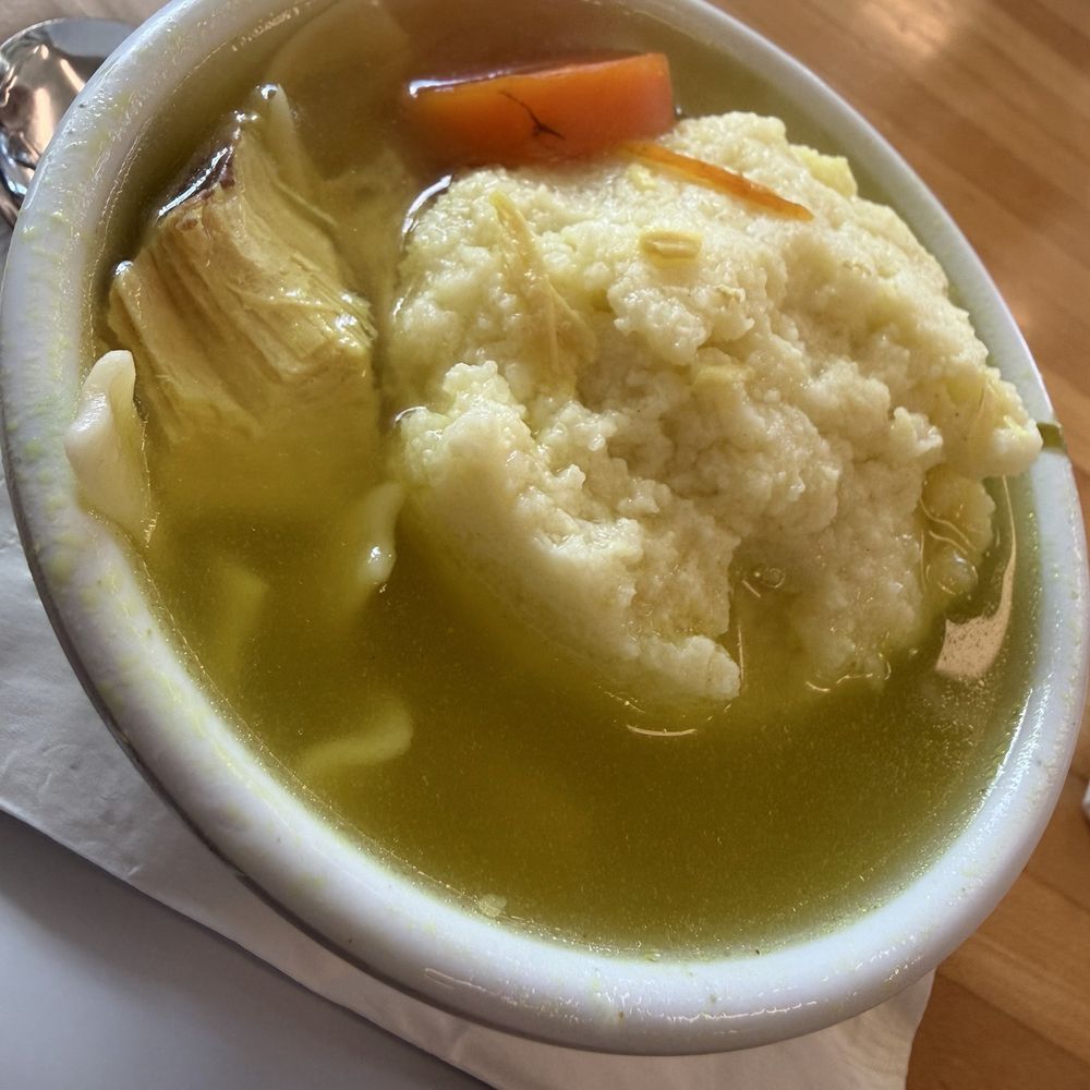 Bagel Bar East - Matzoh ball chicken noodle soup (1/2 Sandwich, Cup of Soup) - Bagels Near Me - North Miami, Florida Bagel Bar East - Matzoh ball chicken noodle soup (1/2 Sandwich, Cup of Soup) - Bagels Near Me - North Miami, Florida