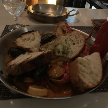 Assaggio - Zuppa di Pesce. Half a lobster. One scallop. Two different types of fish. Tiny shrimp. Mussels. - Italian Near Me - Boston, Massachusetts