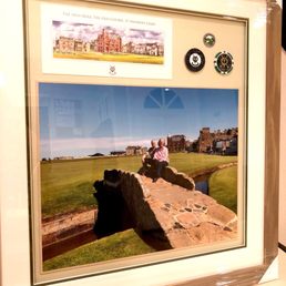 mounted large photo, card and 3 metal ball markers. double mat with custom frame. All mementos from St. Andrews golf course in Scotland. mounted large photo, card and 3 metal ball markers. double mat with custom frame. All mementos from St. Andrews golf course in Scotland.