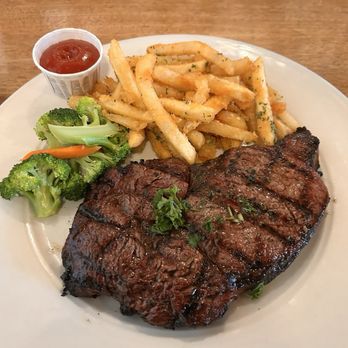 Wrangler's Steakhouse - Ribeye, garlic fries (yum) and fresh veggies - Steakhouses Near Me - Waimea, Hawaii