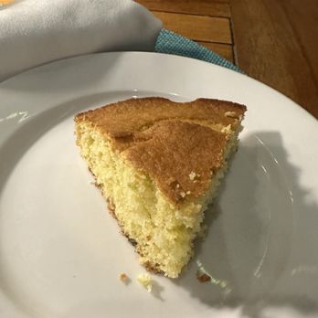 Surfing Deer - Iron Skillet Jalapeño cornbread! Served warm in a skillet with clover honey butter - Seafood Near Me - Seagrove Beach, Florida