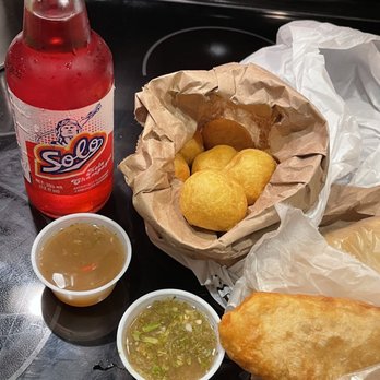 Naz Roti Palace - Pholourie and alloo pies with red solo - Trinidadian Near Me - Miramar, Florida