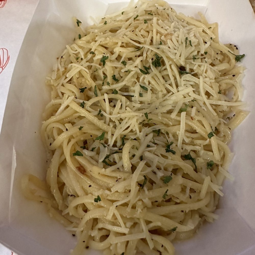 Cap't Loui - The garlic spaghetti is our favorite side. - Cajun/Creole Near Me - Providence, Rhode Island