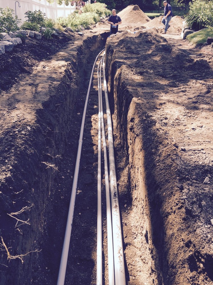 Slide of EmRay Excavating