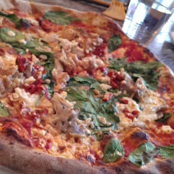 Pizzeria Ludica - Carcassonne - chicken, spinach, sun-dried tomatoes, roasted garlic, feta, mozzarella - Pizza Near Me - Vancouver, British Columbia