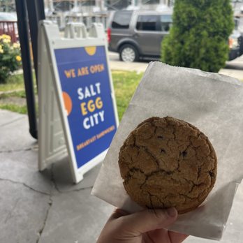 Salt Egg City - a hand holding a cookie - Breakfast & Brunch Near Me - Salt Lake City, Utah Salt Egg City - a hand holding a cookie - Breakfast & Brunch Near Me - Salt Lake City, Utah