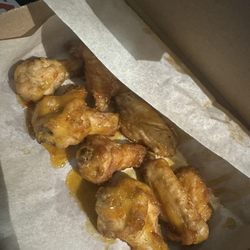 Domino's Pizza - They get pre-cooked frozen wings they heat in the microwave. they don't even put them in the oven. this place is disgusting! don't go here.