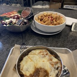 Shrimp and Grits (background), French Onion Soup (foreground). Shrimp and Grits (background), French Onion Soup (foreground).