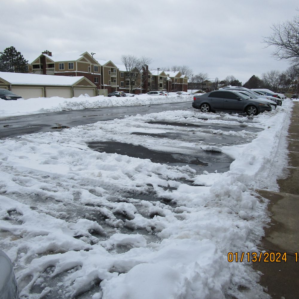 Cottage Hill Property Management - REIS property manager never directed the snow plowing contractor to remove the pile of snow while parking lot are not occupied. - Property Management Near Me - Elmhurst, Illinois