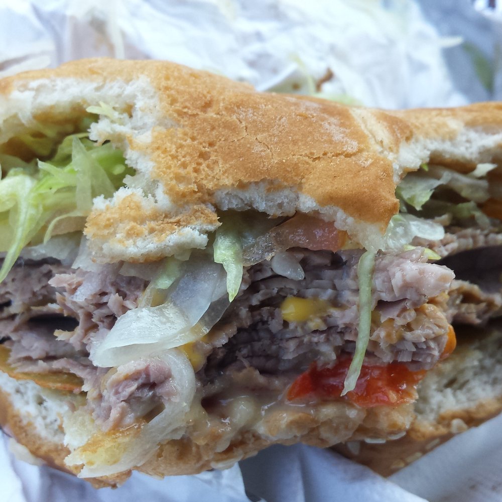 Amiel's Subs & Roast Beef - Half eaten - Sandwiches Near Me - Rochester, New York