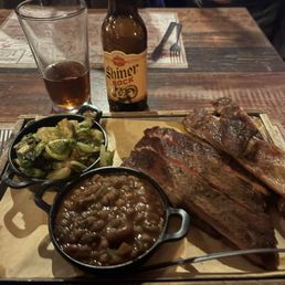 Half rack with baked beans and Roasted Brussel Sprouts! Darn good fixins right there!! Half rack with baked beans and Roasted Brussel Sprouts! Darn good fixins right there!!