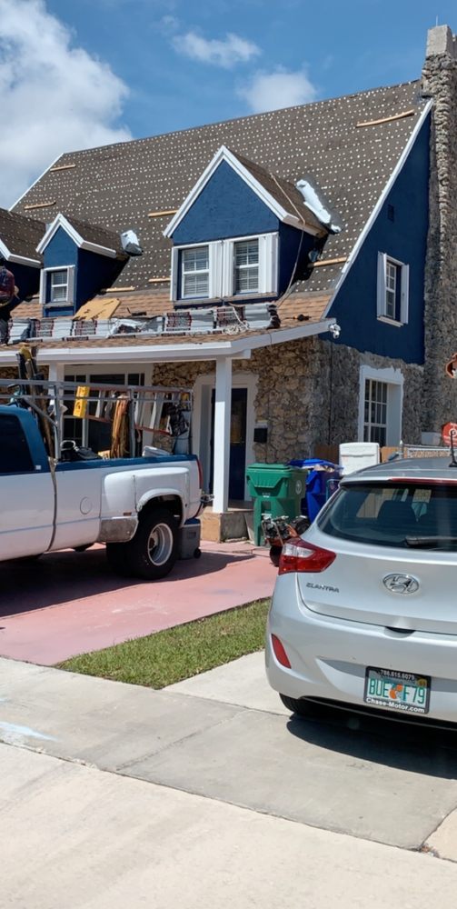 Slide of D-Tech Roofing