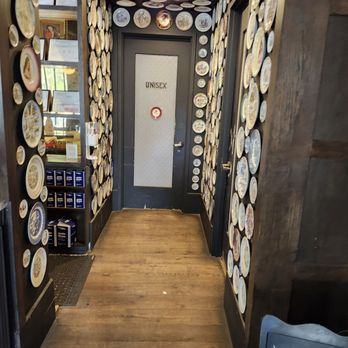 Double Standard - Unisex bathroom and a busy hallway - Bars Near Me - San Antonio, Texas