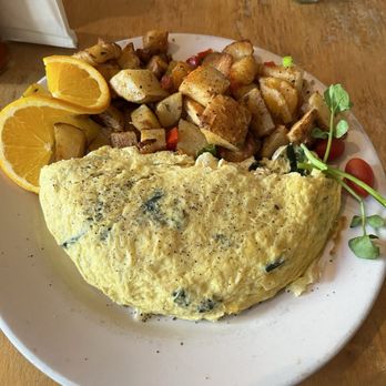 M henry - Dandelion and leeks omelette - Breakfast & Brunch Near Me - Chicago, Illinois M henry - Dandelion and leeks omelette - Breakfast & Brunch Near Me - Chicago, Illinois