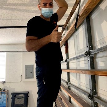 Handy Garage Doors Co. - My cool technician - Garage Door Services Near Me - Wilton Manors, Florida Handy Garage Doors Co. - My cool technician - Garage Door Services Near Me - Wilton Manors, Florida
