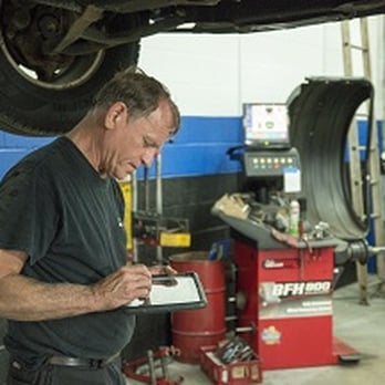 Foreign Auto Services - Technician performing a digital courtesy inspection. - Auto Repair Near Me - Chantilly, Virginia Foreign Auto Services - Technician performing a digital courtesy inspection. - Auto Repair Near Me - Chantilly, Virginia