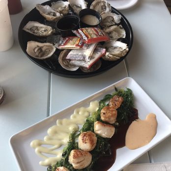 Miller's Waterfront Restaurant - Raw oysters and seared scallops - Seafood Near Me - Nags Head, North Carolina Miller's Waterfront Restaurant - Raw oysters and seared scallops - Seafood Near Me - Nags Head, North Carolina