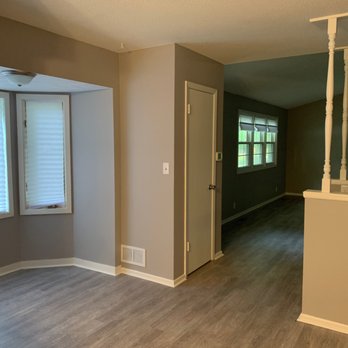 Affordable Home Improvement - empty living room and stairs - Painters Near Me Affordable Home Improvement - empty living room and stairs - Painters Near Me